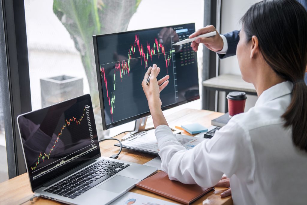 a business woman noticing a trend in a stock